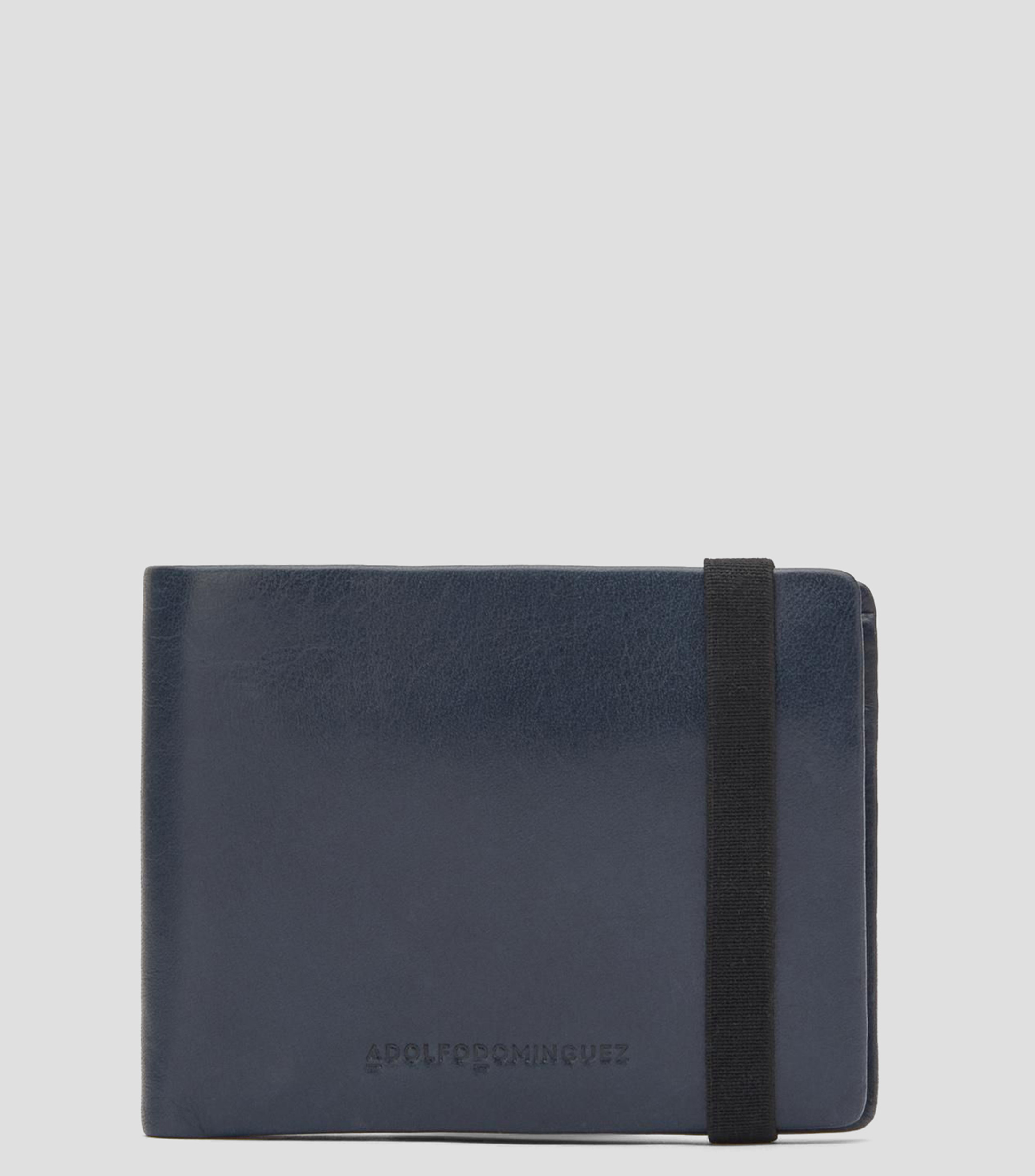 Cartera bifold en piel lisa con detalle texturizado Hombre